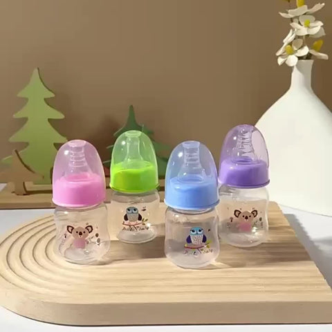 Portable 60ml Baby Bottle with Silicone Nipple for Newborns Up to 6 Months, Ideal for Infant Care.